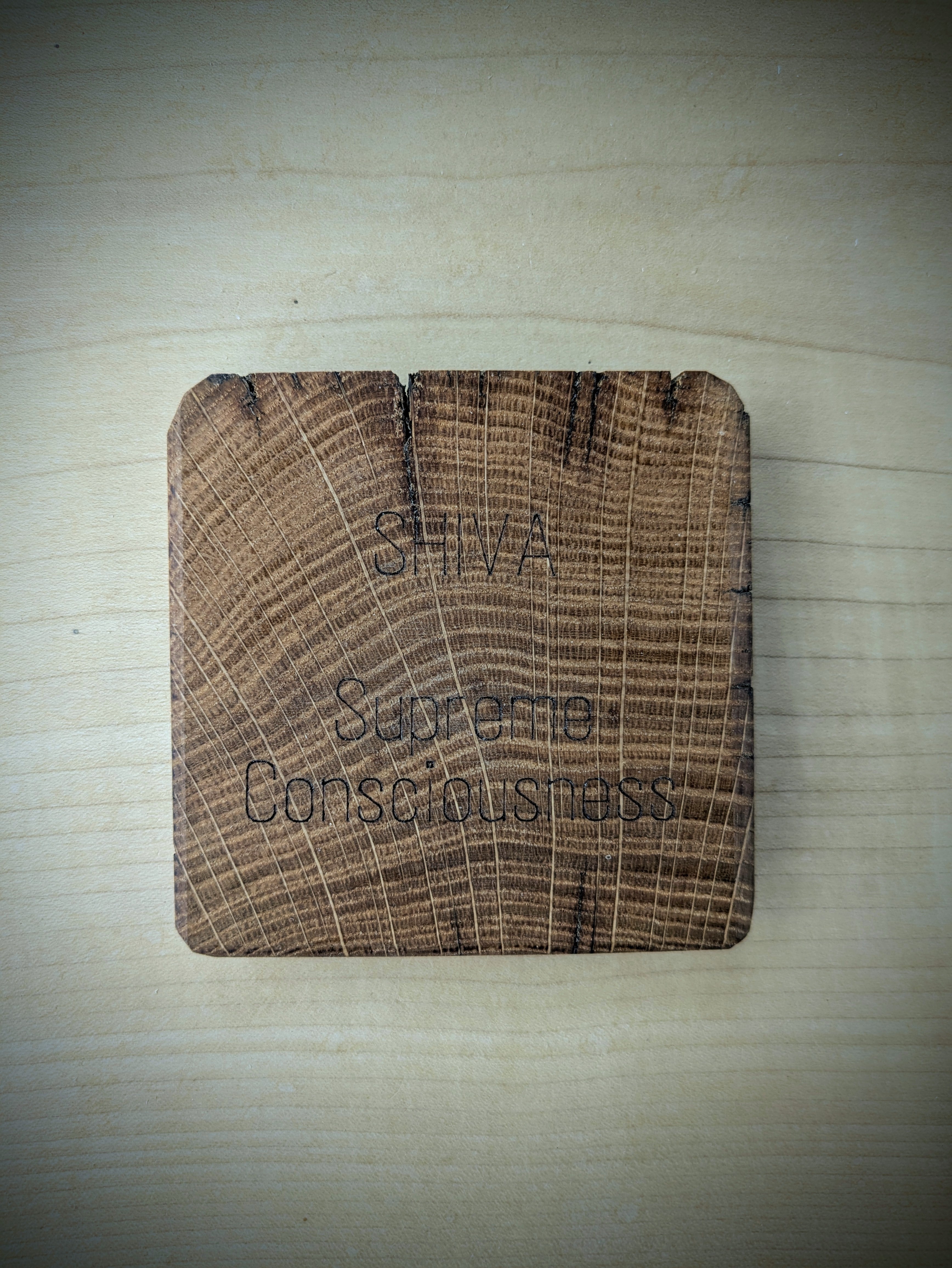 Spiritual cosmic coaster made out of reclaimed Welsh oak fence posts