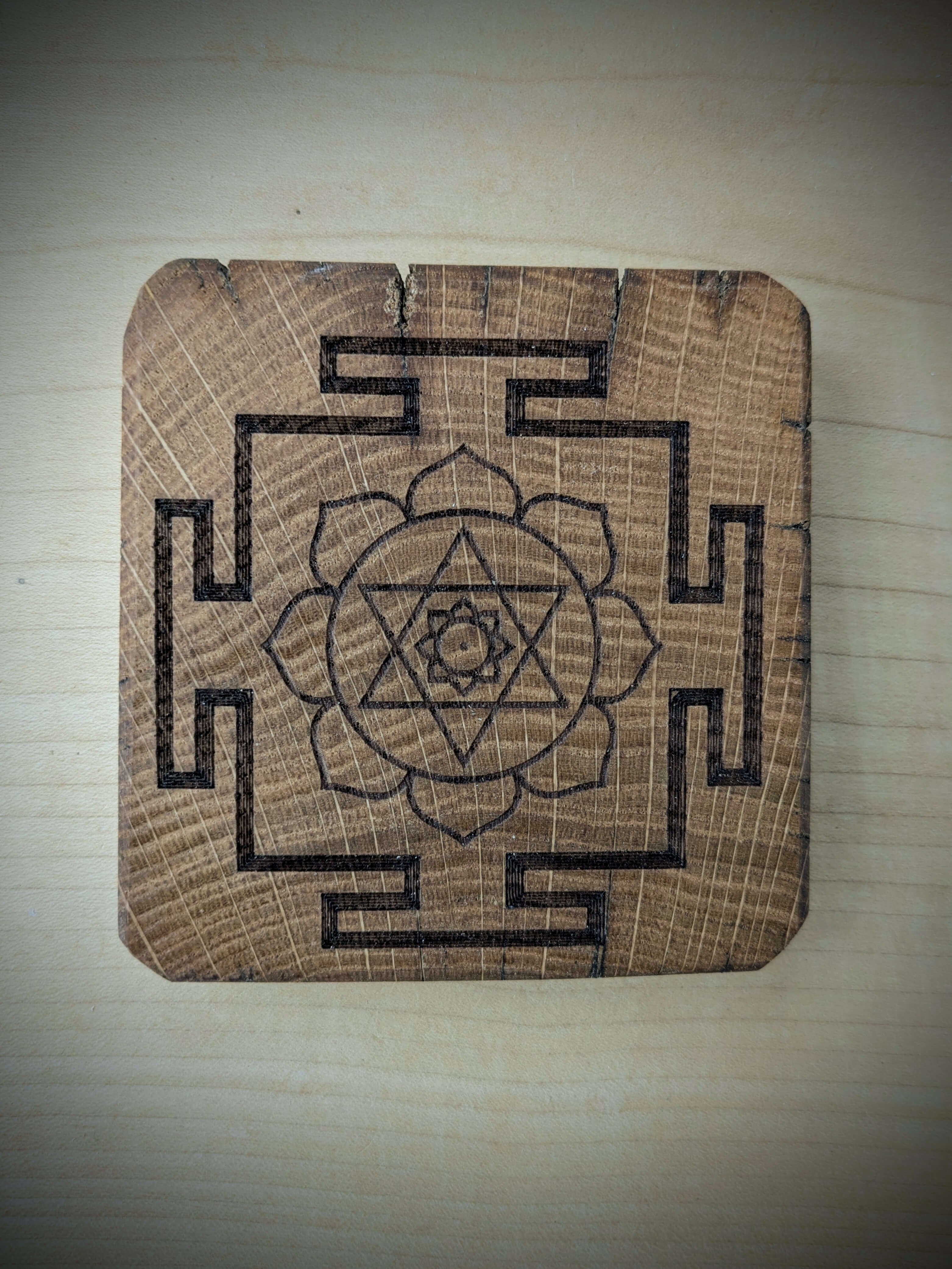 Spiritual cosmic coaster made out of reclaimed Welsh oak fence posts