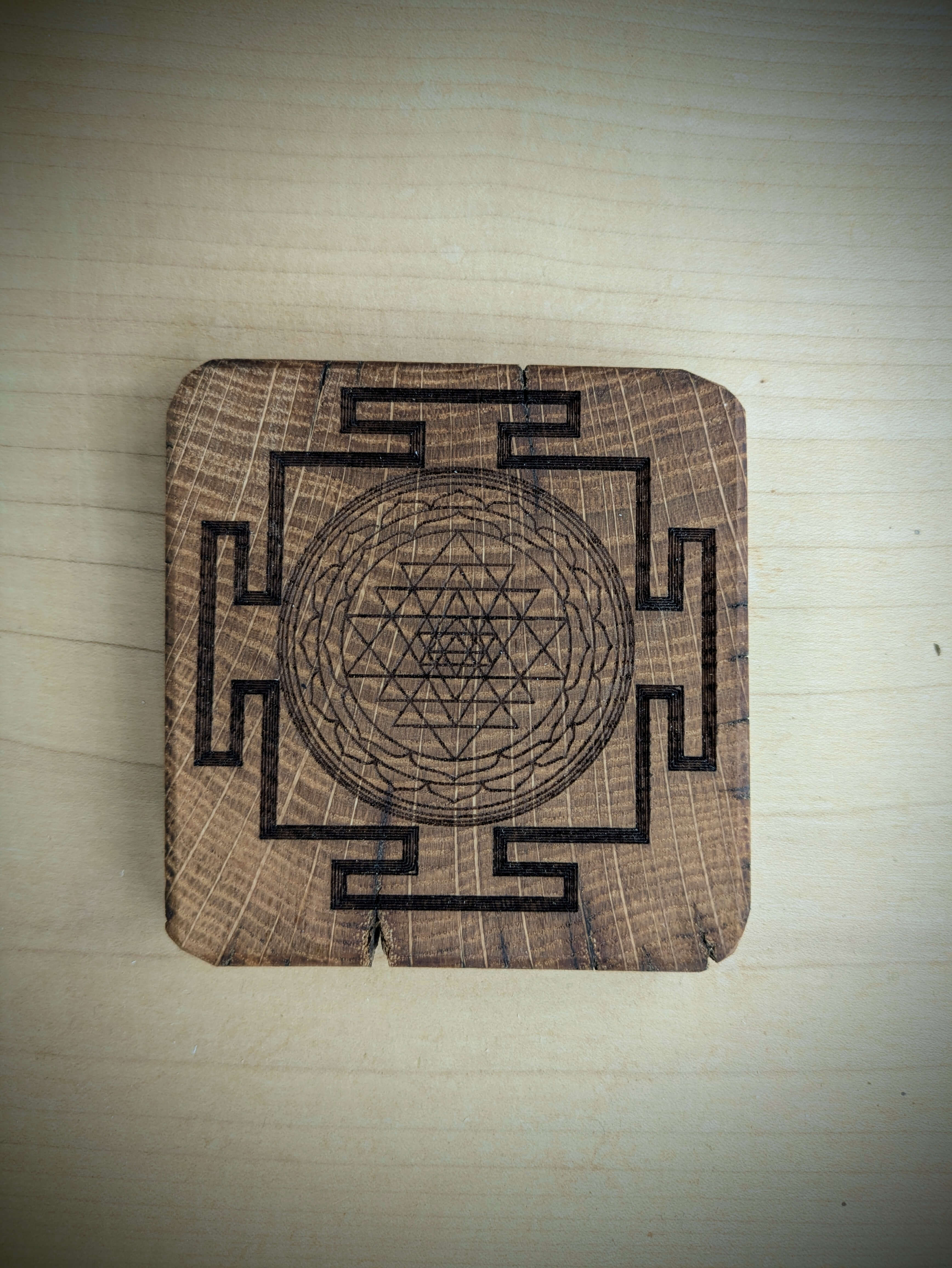 Spiritual cosmic coaster made out of reclaimed Welsh oak fence posts