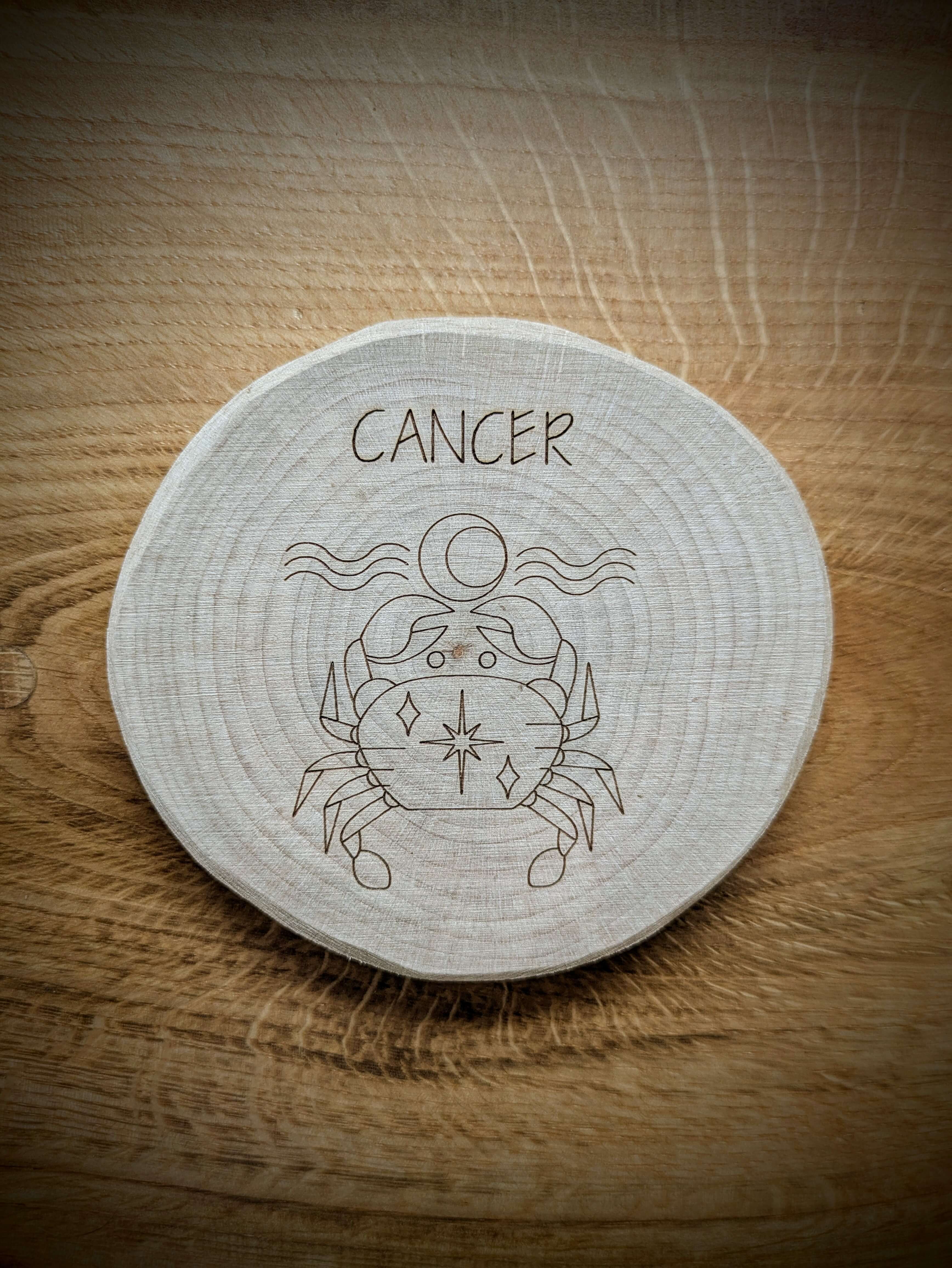 Cancer Zodiac Kosmic Coaster on reclaimed Welsh timber