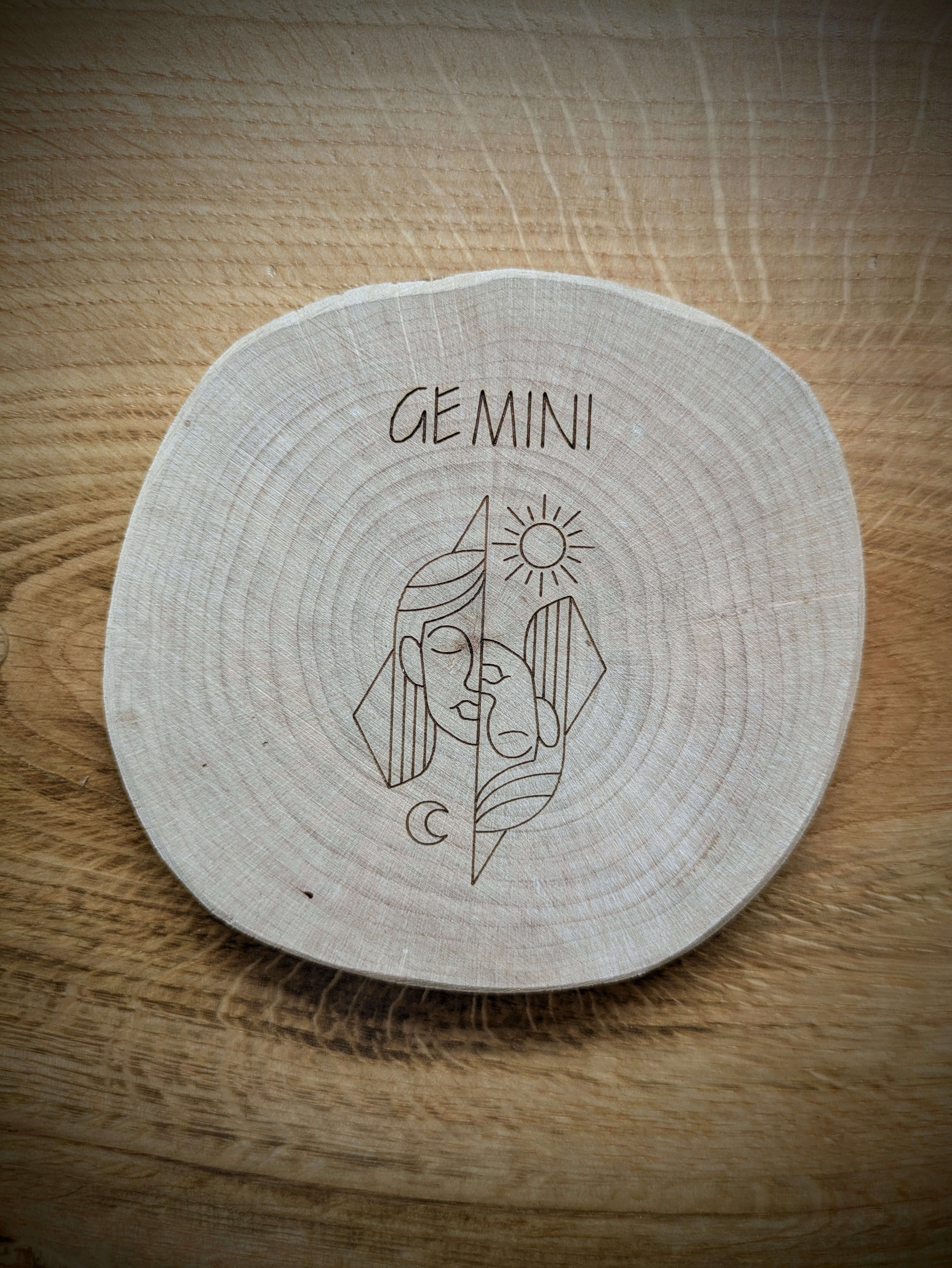Gemini Zodiac Kosmic Coaster on reclaimed Welsh timber