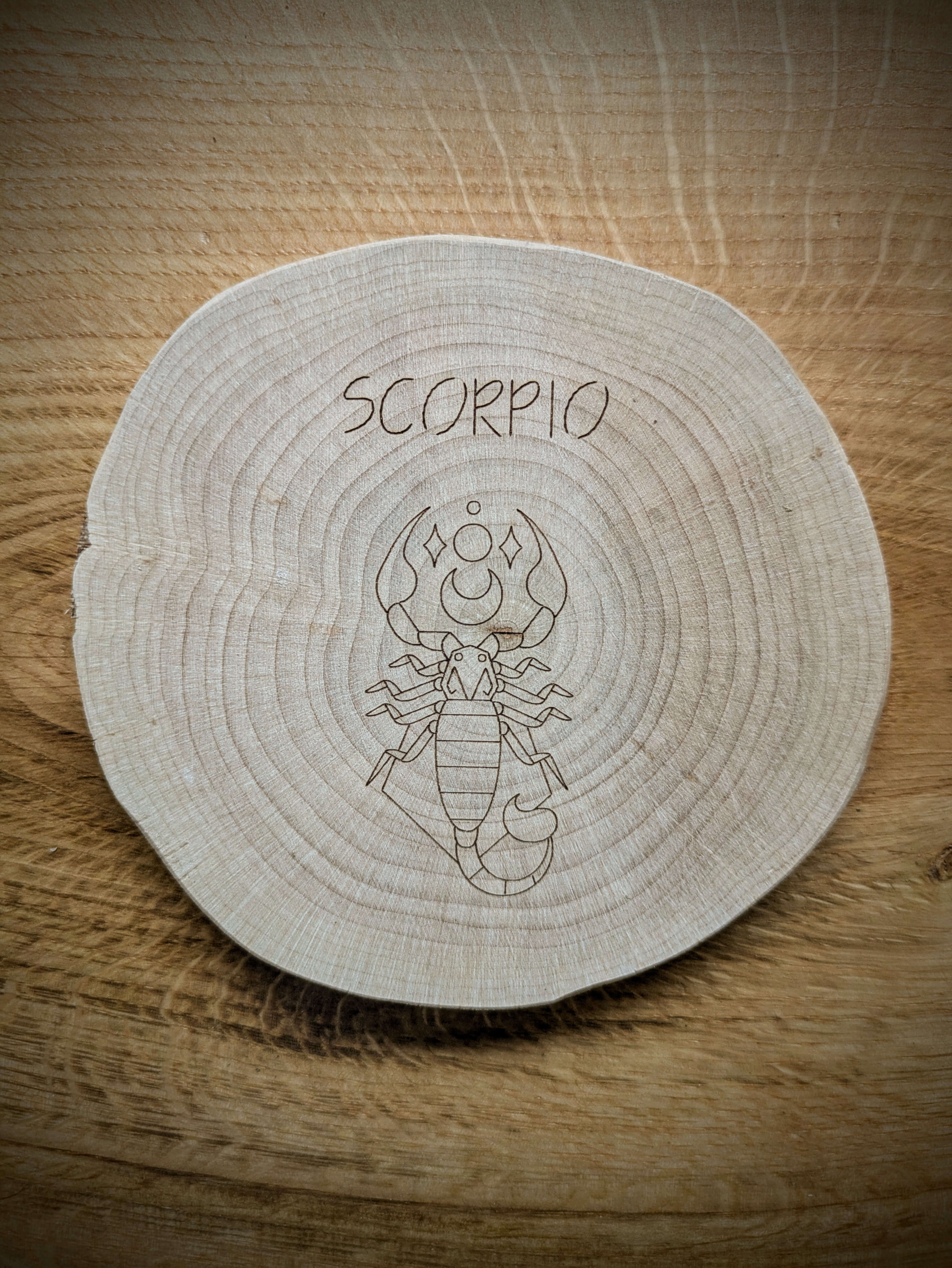 Scorpio Zodiac Kosmic Coaster on reclaimed Welsh timber