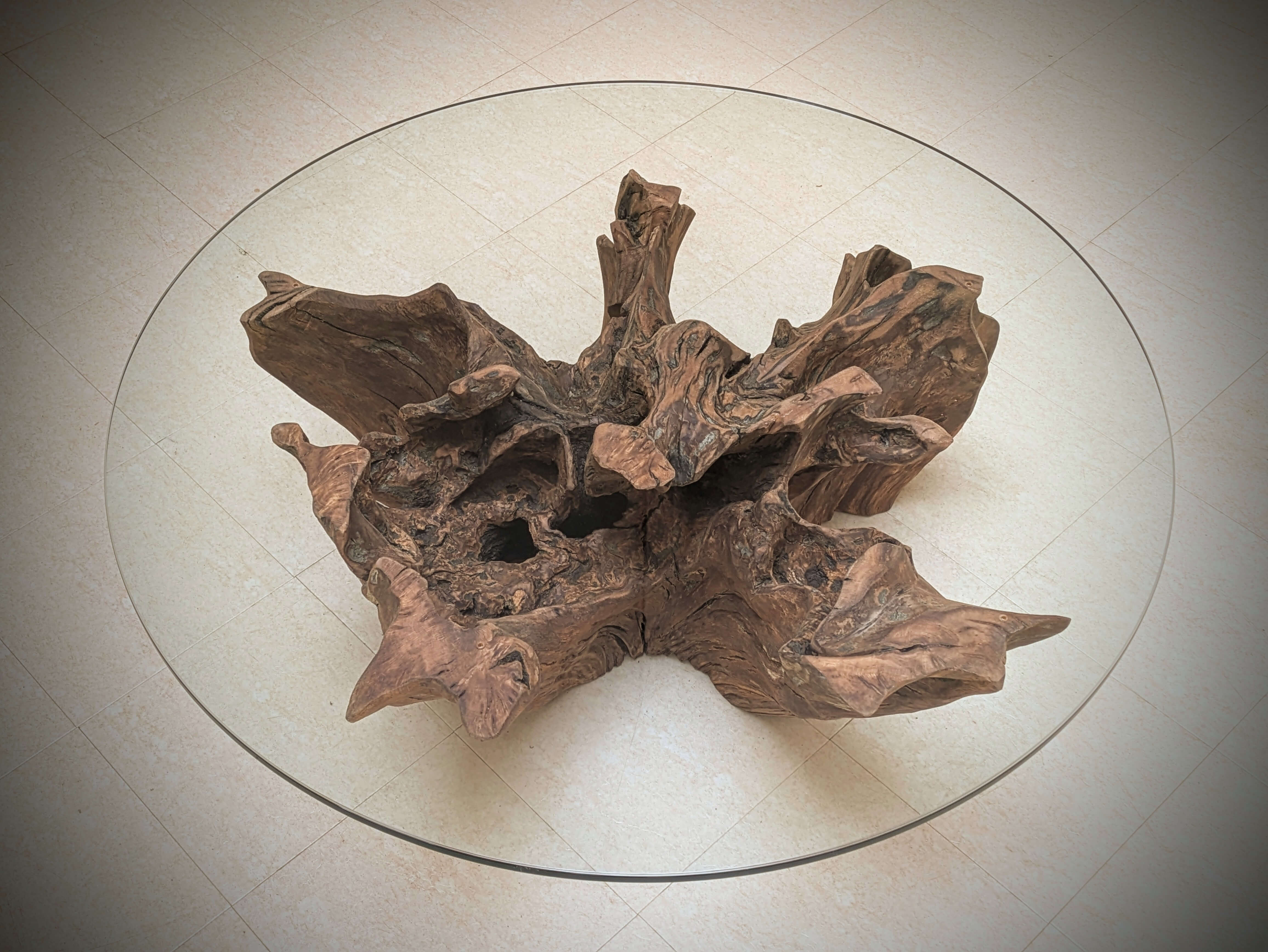 A reclaimed Oak Stump Table, with a glass top