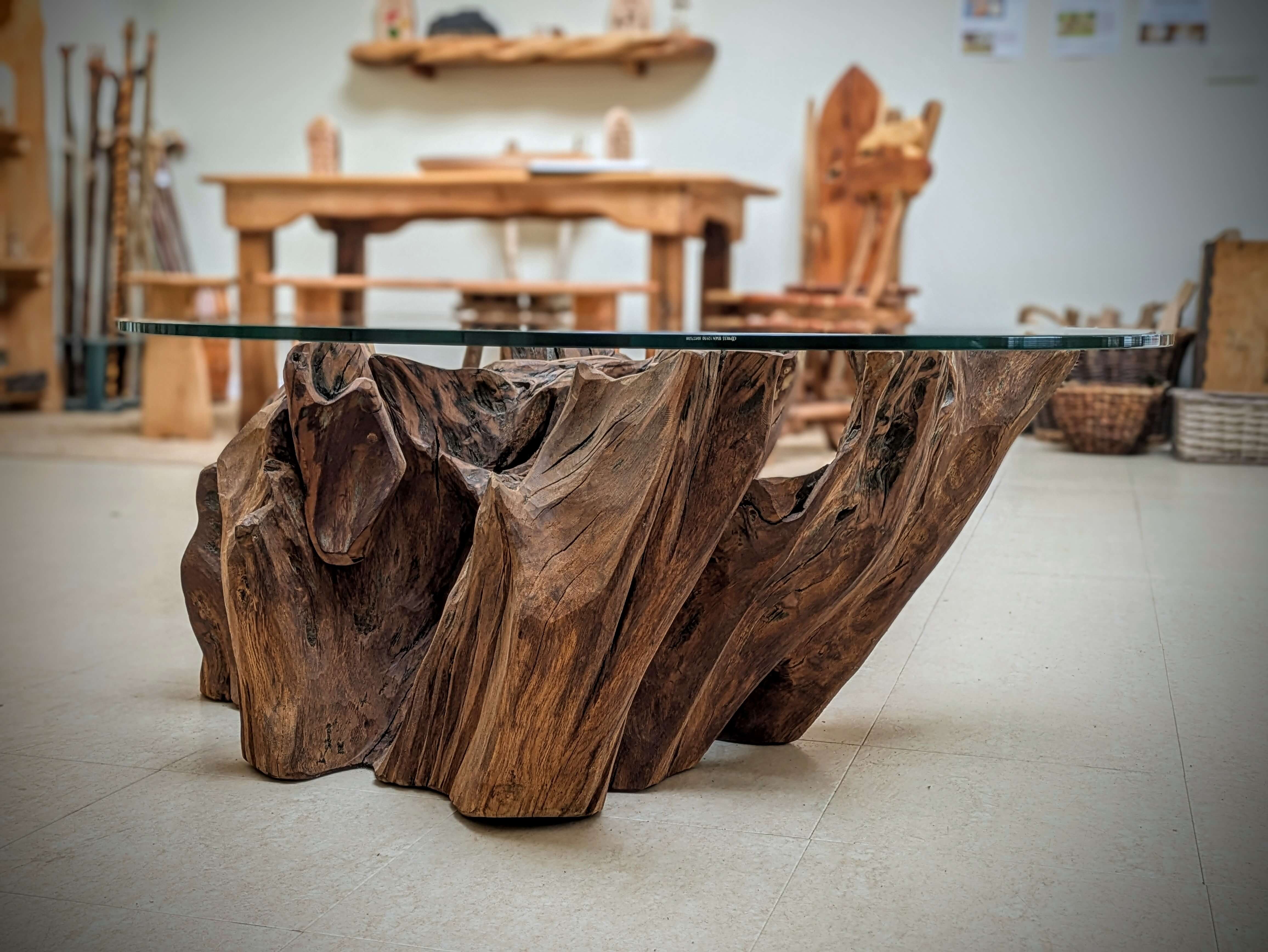 A reclaimed Oak Stump Table, with a glass top