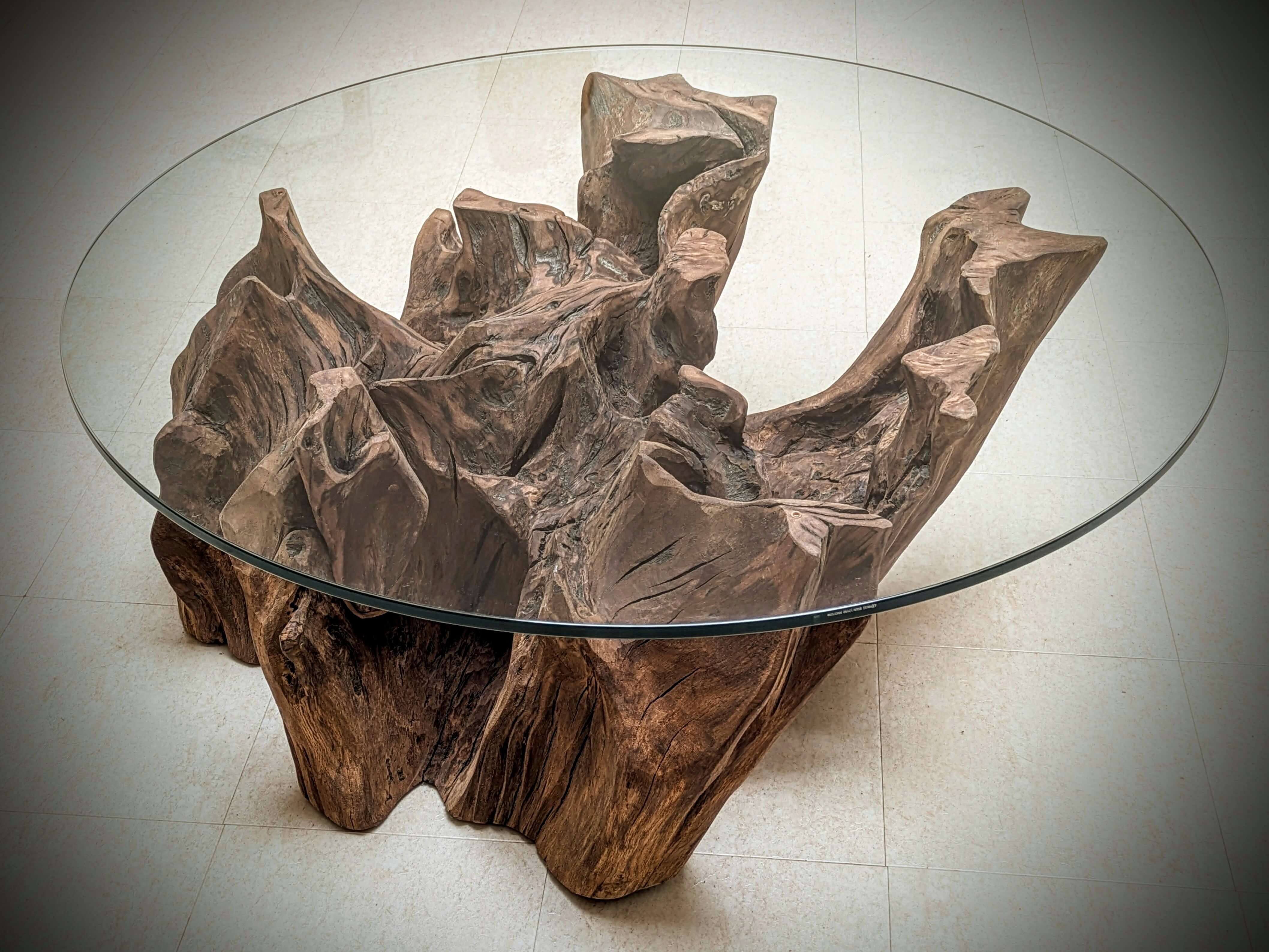 A reclaimed Oak Stump Table, with a glass top