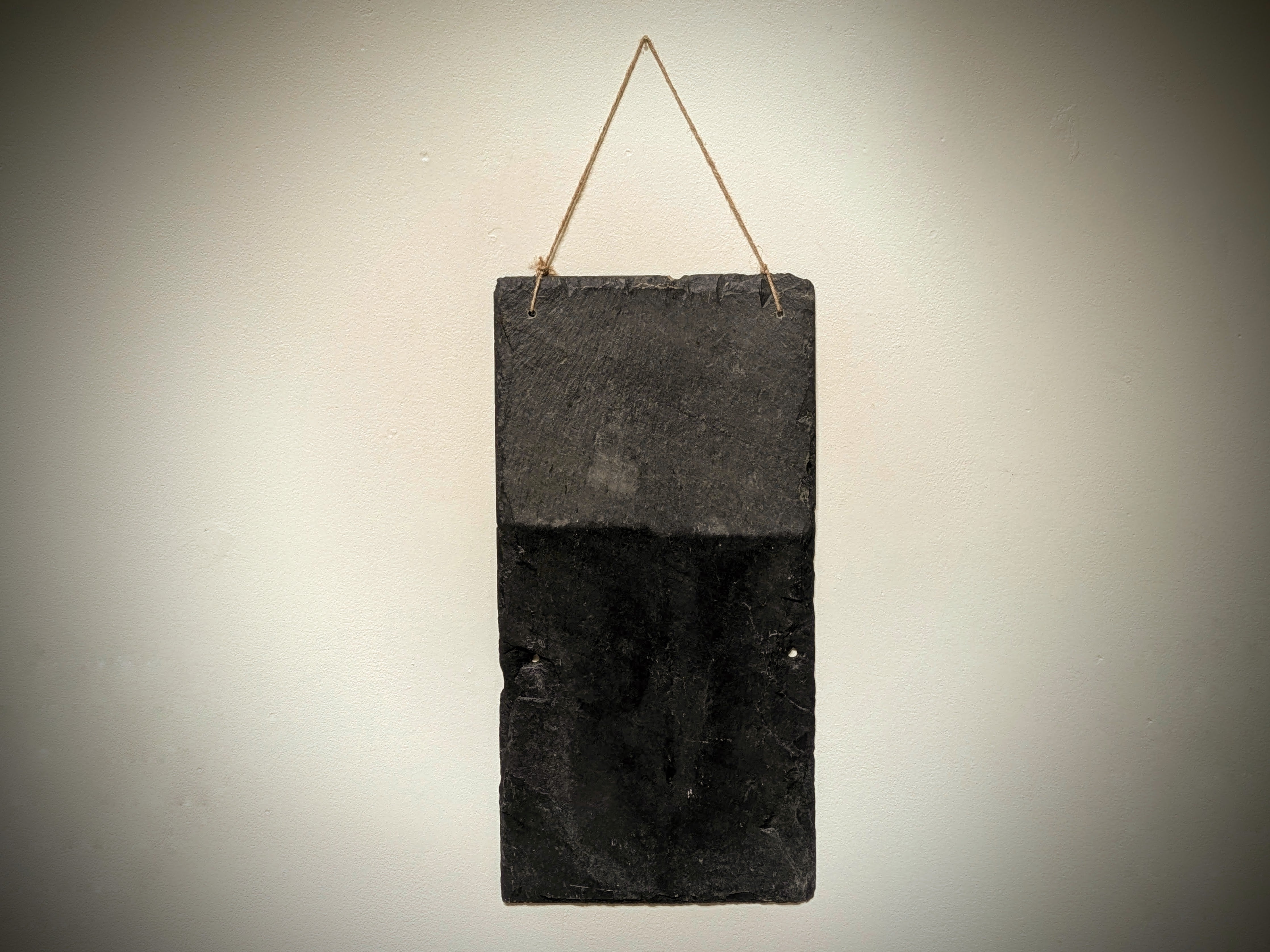 A reclaimed Welsh slate chalk board