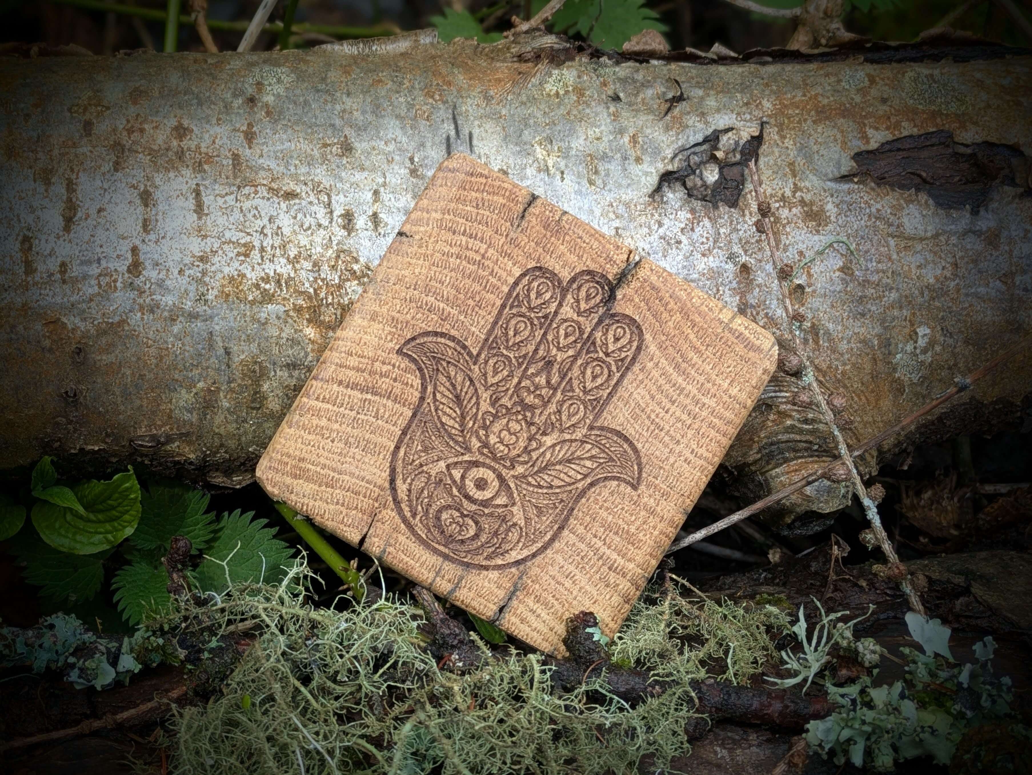 The Hand of Fatima coaster on reclaimed fence posts
