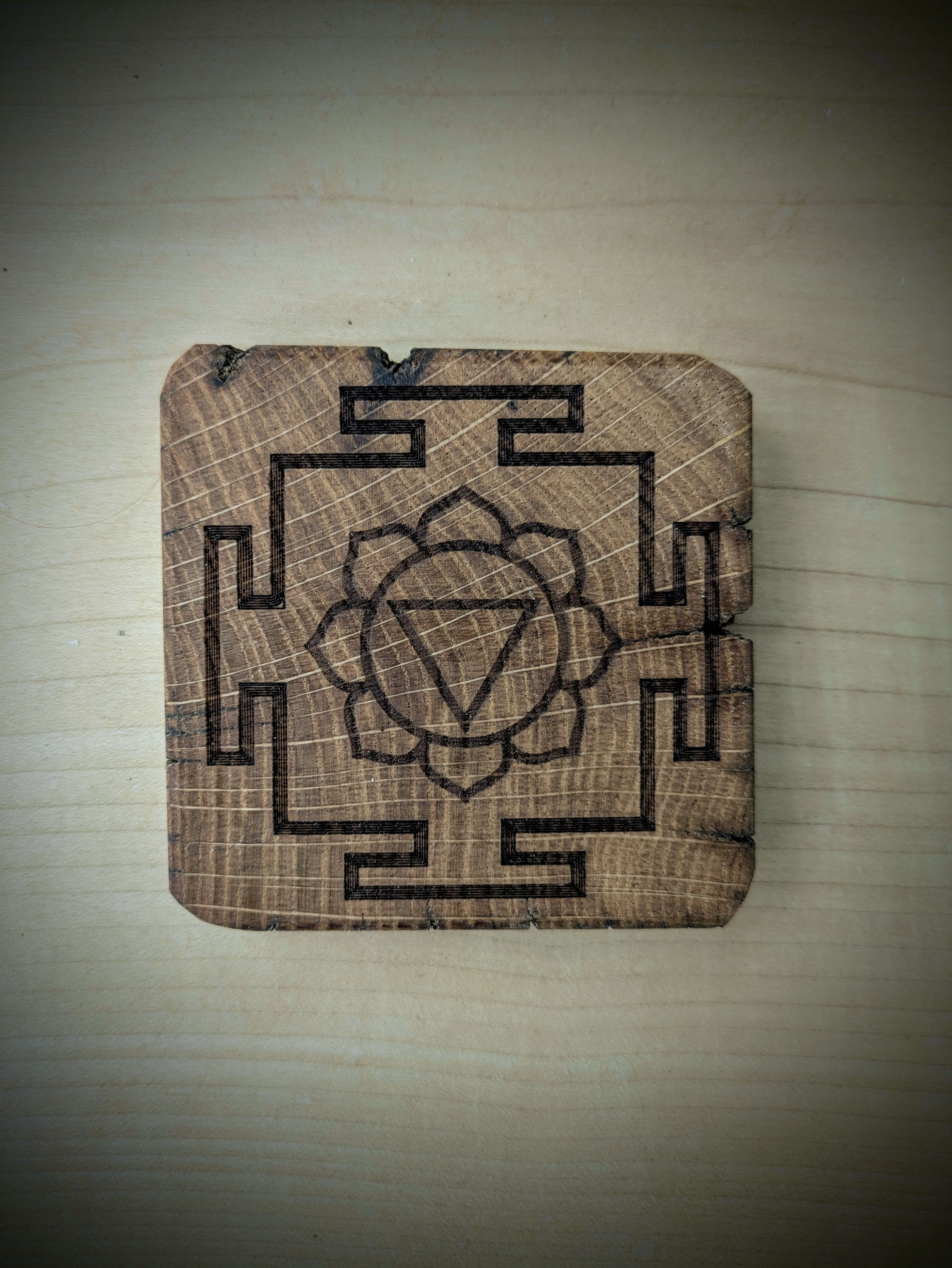Spiritual cosmic coaster made out of reclaimed Welsh oak fence posts