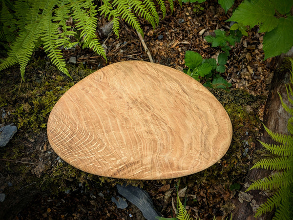 A handmade wooden chopping board made with reclaimed Welsh timber