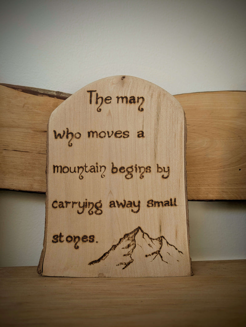 The man who moves a mountain begins by carrying away small stones pyrography, woodburning 