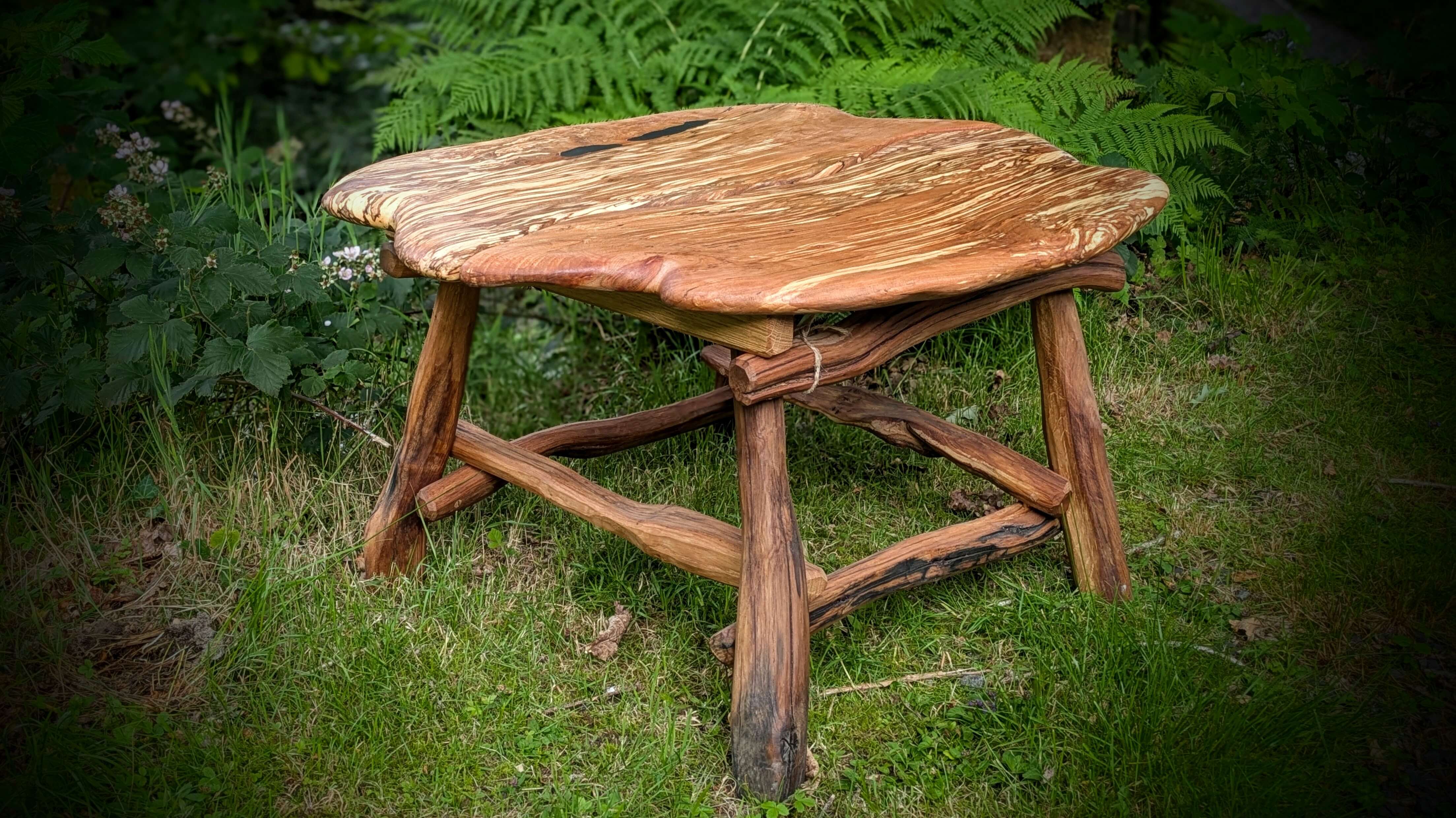 A large coffee table made out of reclaimed welsh timber