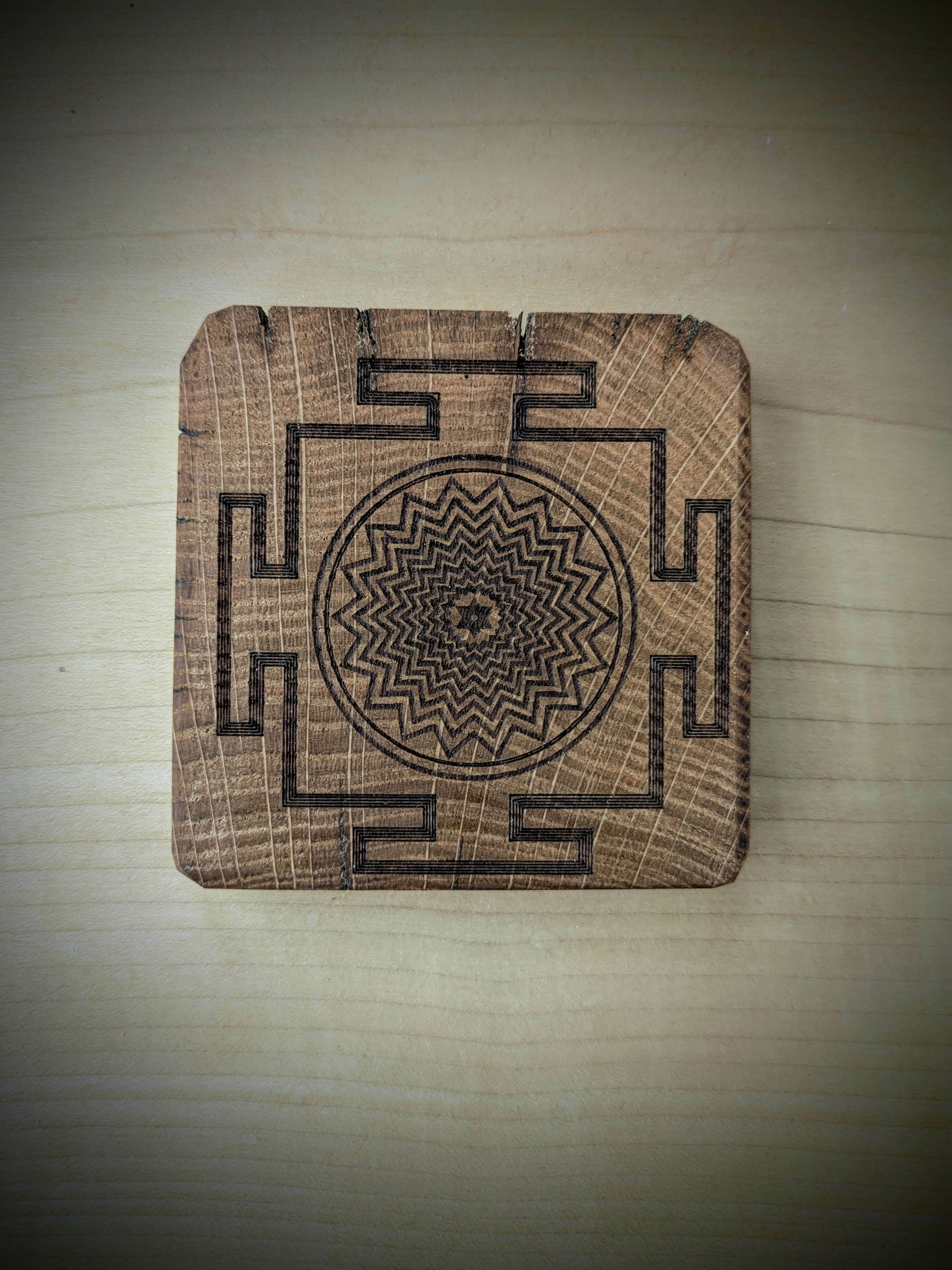 Spiritual cosmic coaster made out of reclaimed Welsh oak fence posts