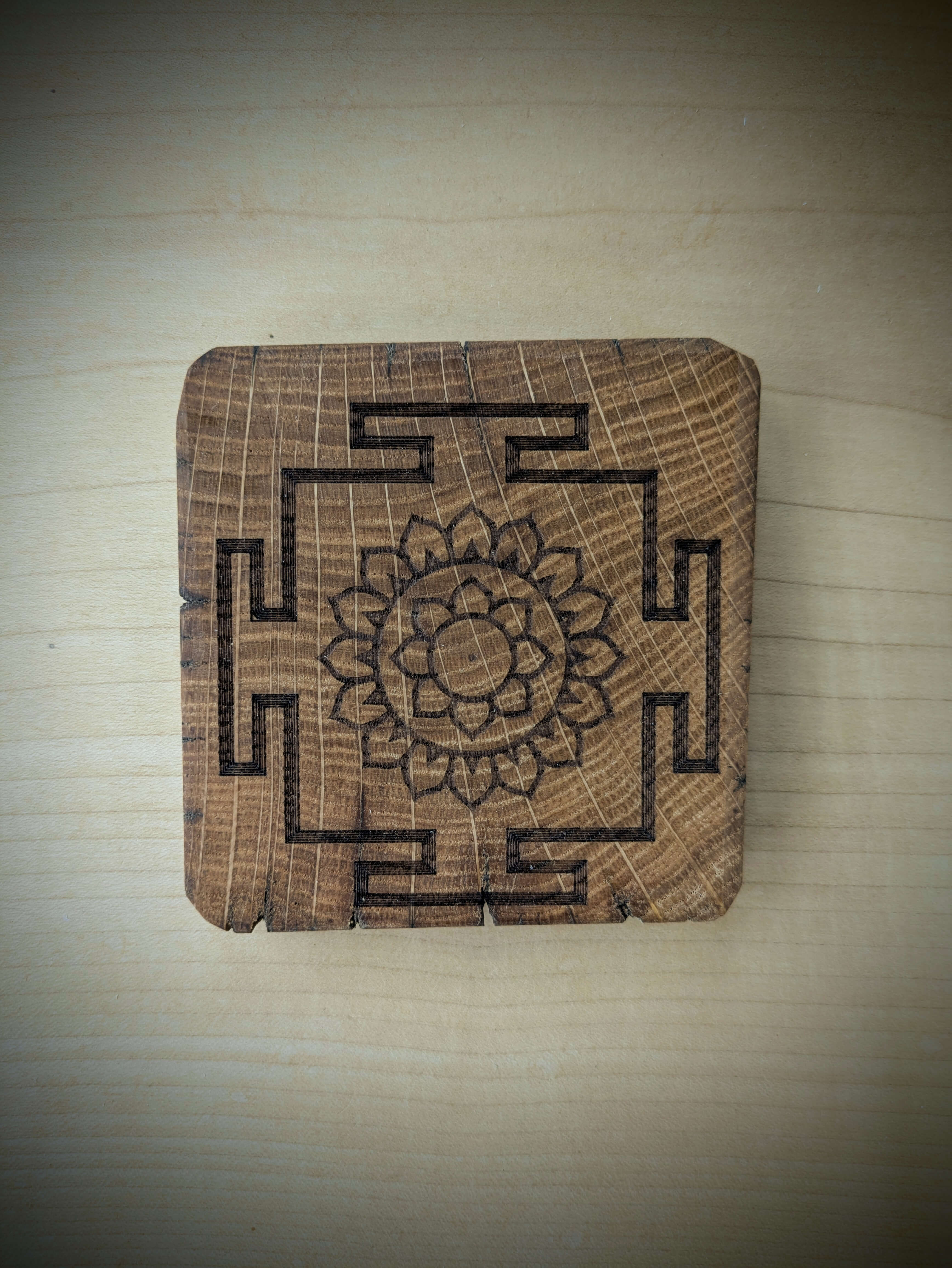 Spiritual cosmic coaster made out of reclaimed Welsh oak fence posts