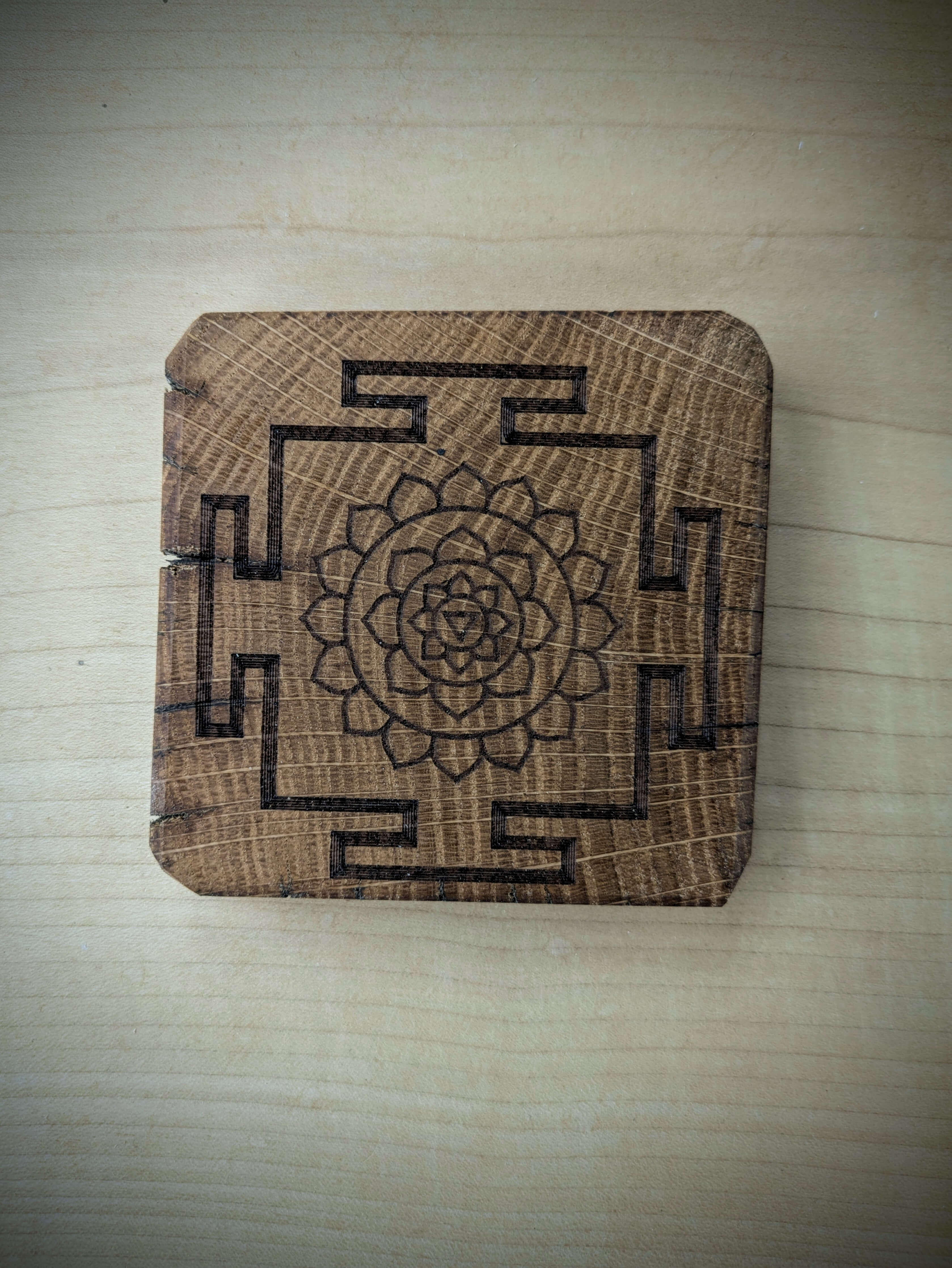 Spiritual cosmic coaster made out of reclaimed Welsh oak fence posts
