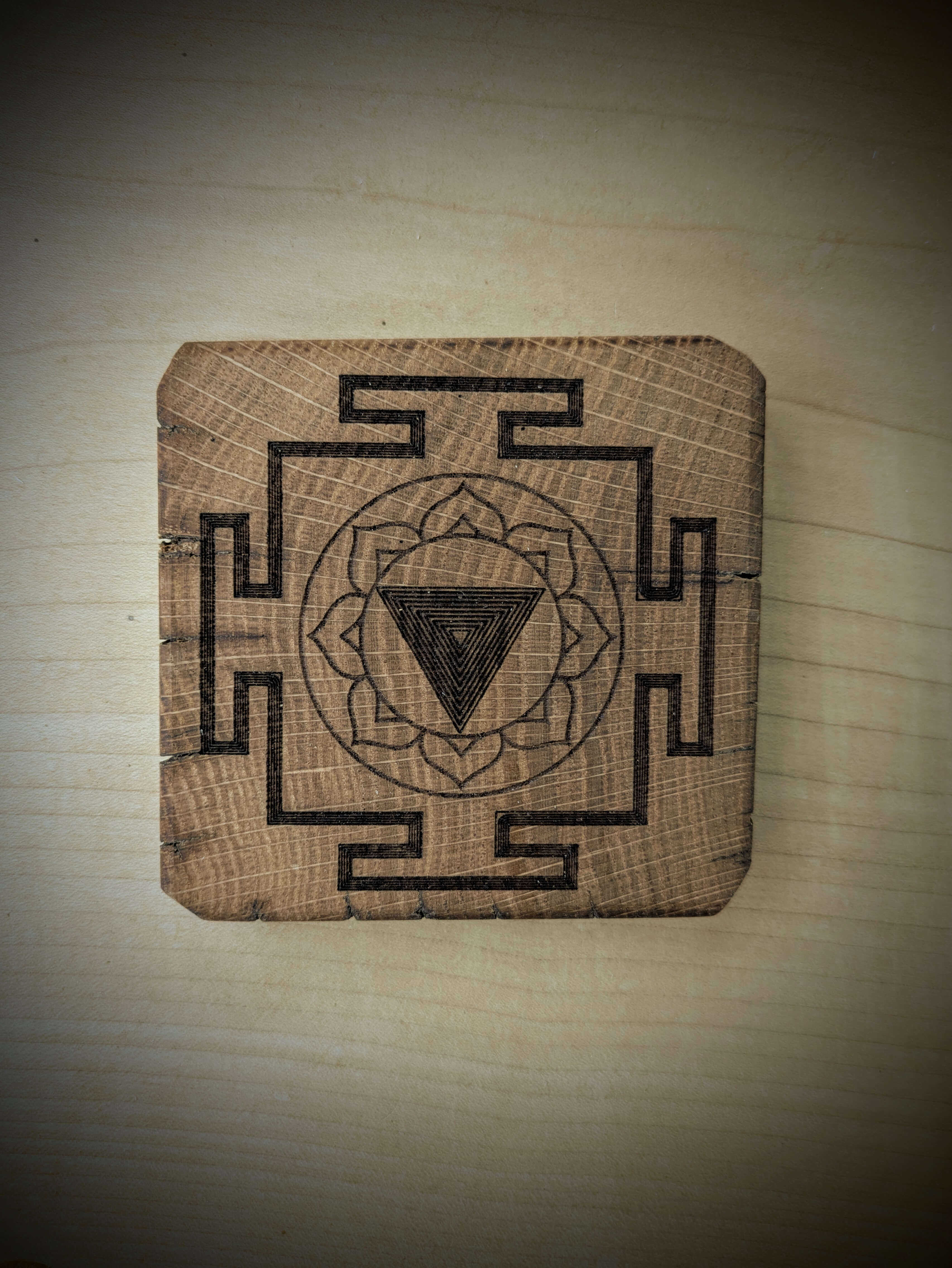 Spiritual cosmic coaster made out of reclaimed Welsh oak fence posts