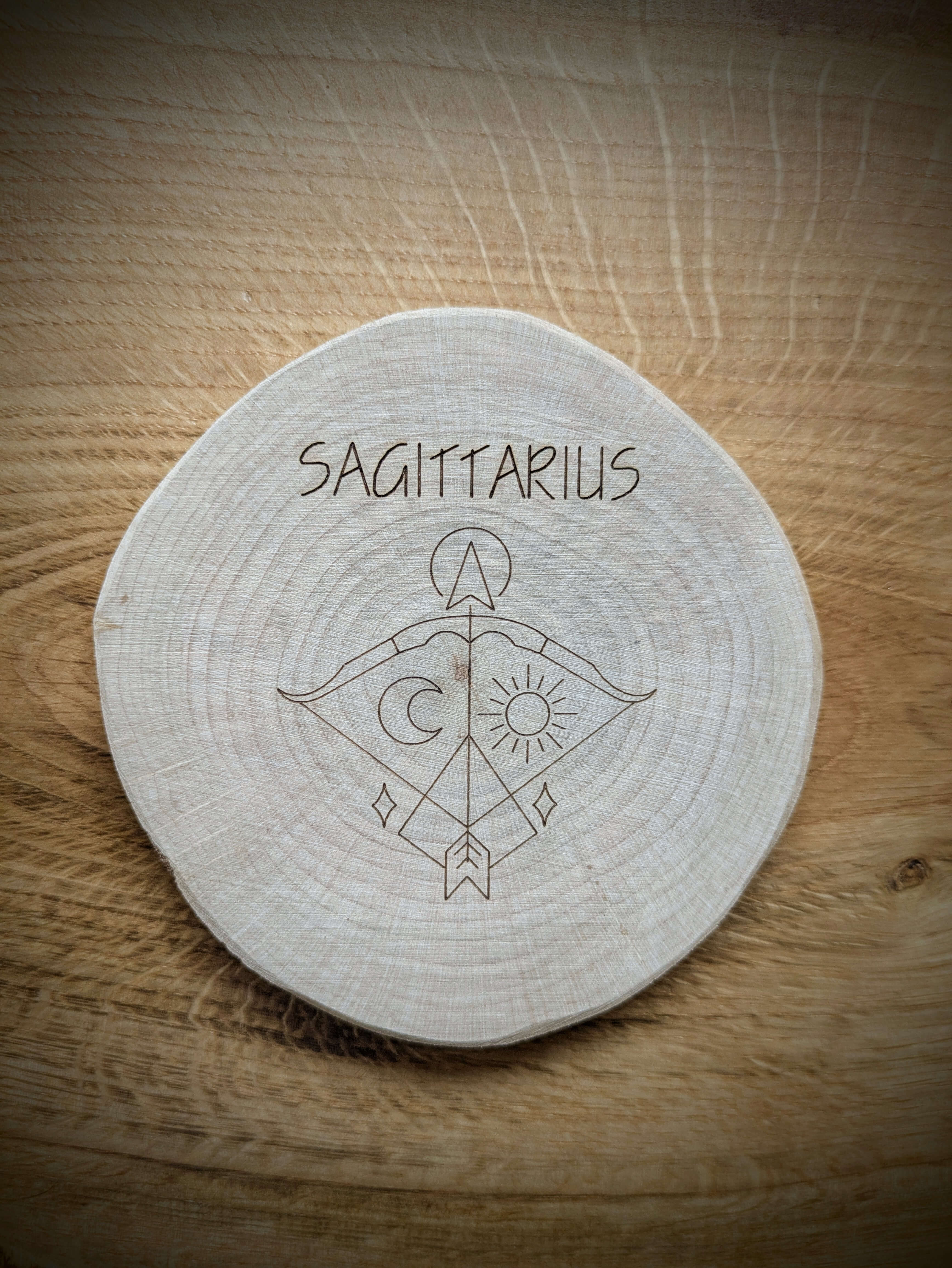 Sagittarius Zodiac Kosmic Coaster on reclaimed Welsh timber