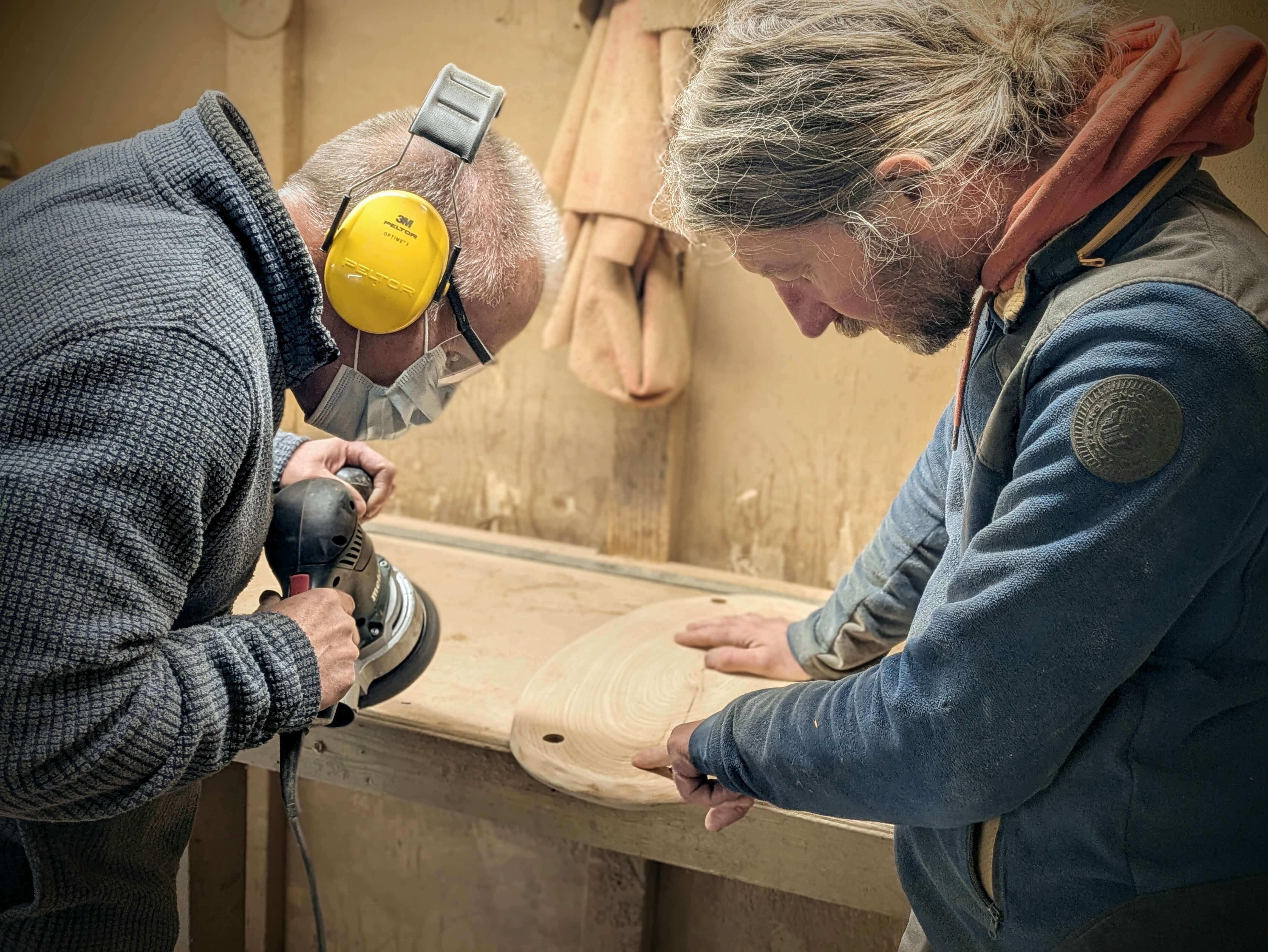 Someone taking part in a make a swing woodworking course